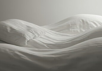 Obraz premium A surreal view of voluminous white bedding arranged to look like rolling hills and smooth, soft landscapes under diffused light, linen, relaxation, pillow