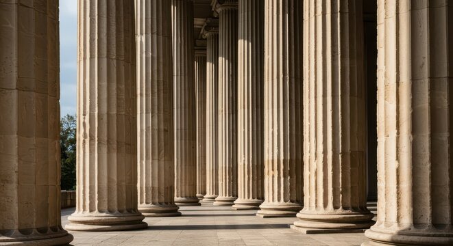 A row of tall, fluted stone pillars supporting a massive classical structure, emphasizing ancient history and strength, building element, decorative, ionic