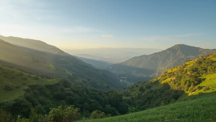 Obraz premium Lush mountains illuminated by sunlight, showcasing seasonal change