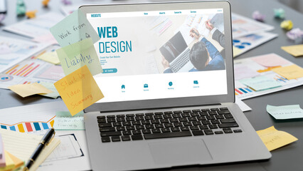 Sticky note for creative and analytic brainstorm for business idea with BI data dashboard on laptop...