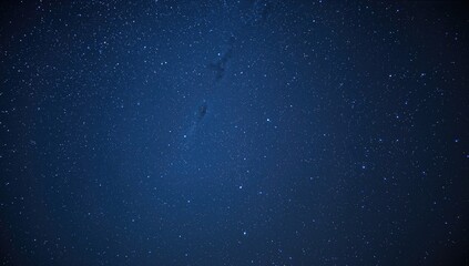 A mesmerizing celestial display featuring countless stars against a deep blue night sky, ideal for stargazing experiences