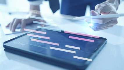 Project management concept, colleagues collaborating on a teamwork project timeline task and team planning a schedule, virtual analytics dashboard