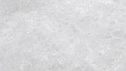 Thick bubble bath foam texture, close-up soap bubbles in a bathtub, relaxation at home, self-care moment