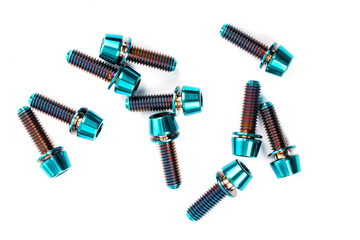 Blue titanium hexagonal bolts on a white background