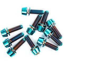 Blue titanium hexagonal bolts on a white background