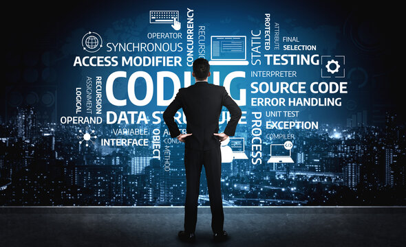 A businessman contemplates technology and coding in front of a visually striking wall filled with programming terms, showcasing software development themes against a city night backdrop. Tessel