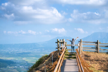 woman at Nishiyunouraenchi Observatory view Mt. Aso, Kumamoto