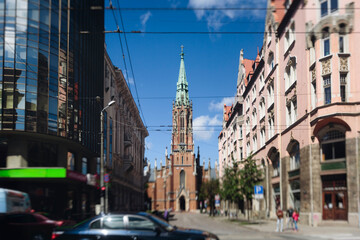 Naklejka premium Riga Old Town view, Latvia, streets of Vecriga historical center with Town Hall square, House Of The Black Heads, Cathedral and church, travel to Latvia and Baltic States, summer day with a blue sky