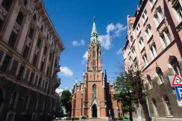 Fototapeta premium Riga Old Town view, Latvia, streets of Vecriga historical center with Town Hall square, House Of The Black Heads, Cathedral and church, travel to Latvia and Baltic States, summer day with a blue sky