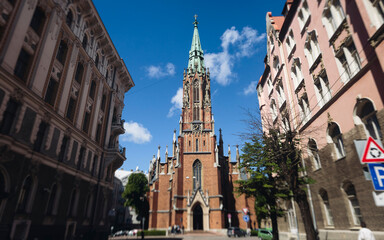 Fototapeta premium Riga Old Town view, Latvia, streets of Vecriga historical center with Town Hall square, House Of The Black Heads, Cathedral and church, travel to Latvia and Baltic States, summer day with a blue sky