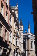 Riga Old Town view, Latvia, streets of  Vecriga historical center with Town Hall square, House Of The Black Heads, Cathedral and church, travel to Latvia and Baltic States, summer day with a blue sky