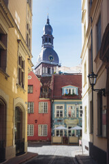 Riga Old Town view, Latvia, streets of  Vecriga historical center with Town Hall square, House Of The Black Heads, Cathedral and church, travel to Latvia and Baltic States, summer day with a blue sky