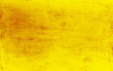 Distressed golden cement wall background with scratch rustic texture