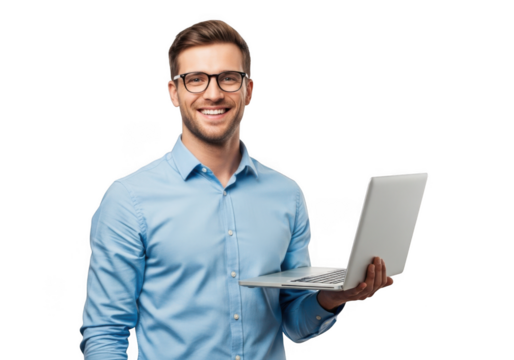 Smiling young man wearing glasses and blue shirt holding a silver laptop computer isolated on transparent background