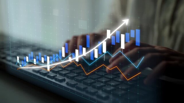 A business professional engages with financial charts and graphs while using a computer keyboard, symbolizing data analysis and market growth in a modern workspace. Copula - Powered by Adobe