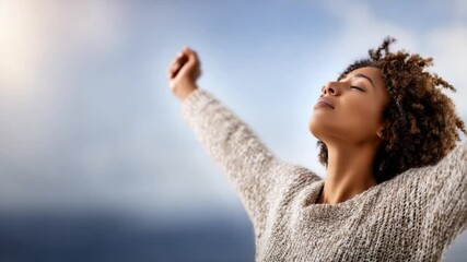 Serenity and Freedom: A woman embraces the expanse of the sky, her arms outstretched in a gesture of pure liberation and contentment, feeling the invigorating touch of the breeze.