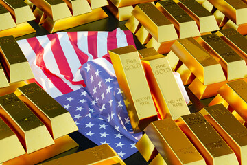 Gold bars stacked over the U.S. flag symbolizing wealth, finance, investment, banking, trading, economics and money market concepts. 3d image.