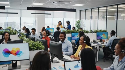 Diverse Team Collaborating in a Modern Open-Plan Office Environment.