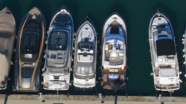 Aerial View: Multi-Million Dollar Superyachts Moored in the Premier Luxury Marinas of Ibiza