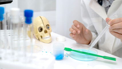 A boy conducts chemical experiments in a chemical laboratory