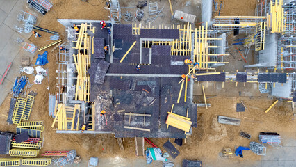 Construction of a private house view from a quadcopter. Selective focus