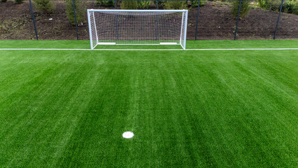 Football goal on a football field view from a quadcopter