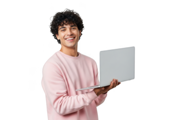 Young man with curly hair wearing a pink sweater holding a silver laptop and smiling brightly isolated on transparent background