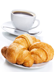 Breakfast with croissants and coffee