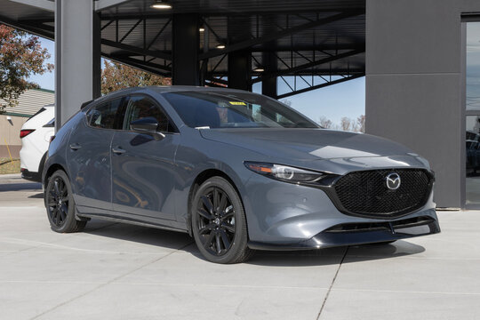Mazda3 Premium Plus AWD Hatchback display. Mazda offers the Mazda3 with a 2.5L Turbocharged 4-Cylinder engine. MY:2025