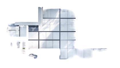 Overhead view of a tiled, modern space with a sharp-angled design, shadows