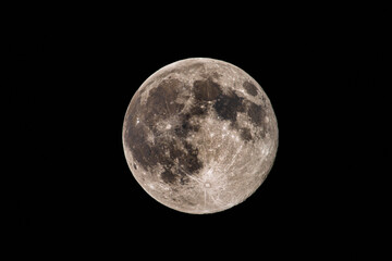 Warm full moon with detailed craters casting soft amber glow over pitchblack sky, inspiring romantic scenes, folklore narratives, night navigation motifs, cinematic backgrounds