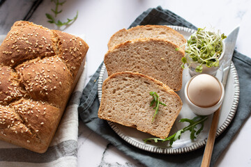 Wholemeal bread with sesame seeds, on the Easter table