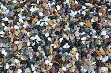 Multicolor decorative gravel material pebble stones for landscaping , rock garden groundcover .background.