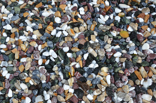 Multicolor decorative gravel material pebble stones for landscaping , rock garden groundcover .background.