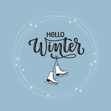 Hello Winter hand lettered phrase with hanging ice skates in a circle of blade trails and sparks