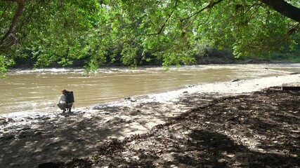 Man walking alone near the river 