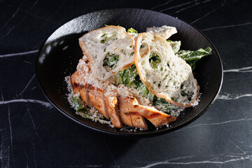 Salmon Fillet With Greens and Parmesan Crumbs Over Bread Slices