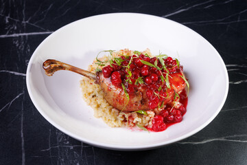 Gourmet Lamb Shank With Cranberry Sauce On Creamy Risotto
