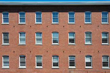 Obraz premium facade view of brick wall and window of old factory building