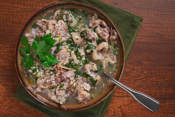 Muzhuzhi, a Georgian dish made from pork legs, with spices and herbs, homemade