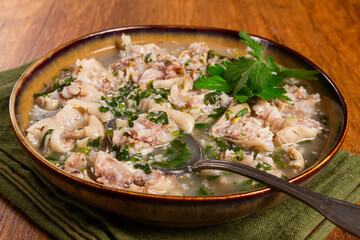 Muzhuzhi, a Georgian dish made from pork legs, with spices and herbs, homemade