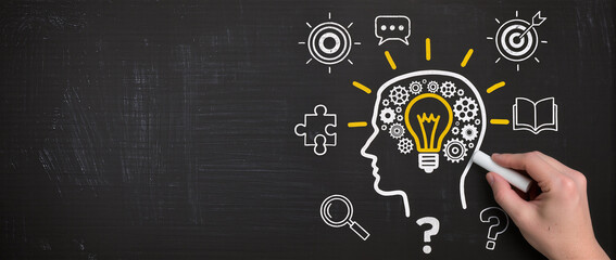 Knowledge, inspiration, Drawing lightbulb and head silhouette on chalkboard