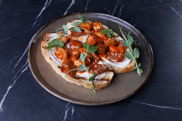 Bruschetta Crostini With Tomato Relish and Fresh Greens