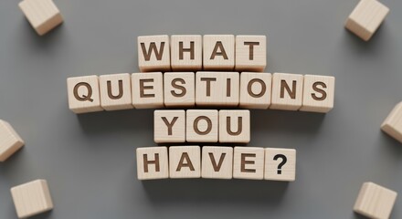 Inquisitive Mind: A mosaic of wooden blocks spells out the thought-provoking question What questions you have? against a neutral backdrop, inviting dialogue and sparking curiosity.