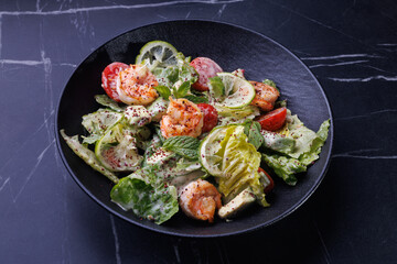 Gourmet Shrimp And Citrus Salad On Black Plate