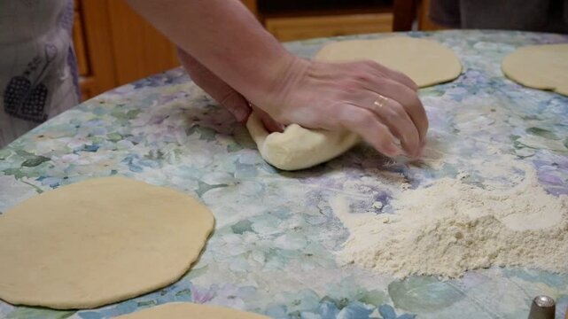 Kneaded flour cut on a tablecloths
