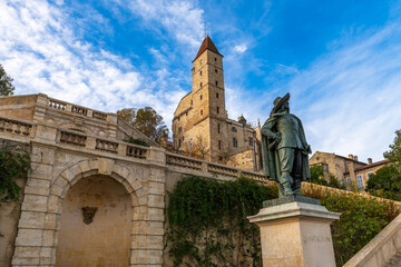 Statue of D'artagnan in front of the Armagnac tower, in Auch, Gers, Occitanie, France.