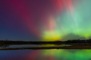 Aurora Borealis with reflections on the Mississippi River