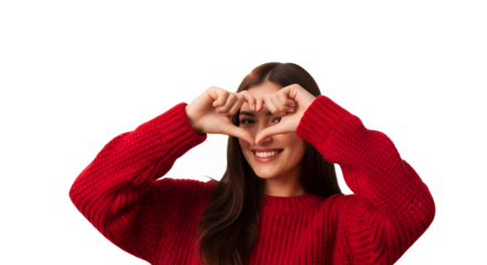 Smiling woman in red sweater making heart shape with hands against on transparent background