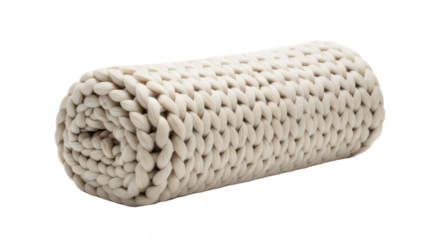 Rolled up chunky knit blanket in cream color against a studio on transparent background